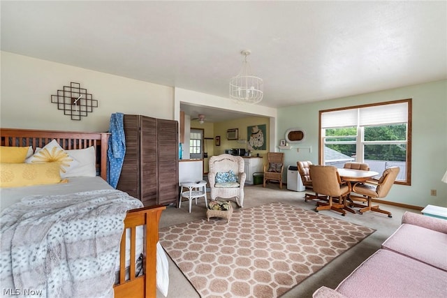 6579 Camp Blvd, Hanoverton, OH 44423 - carpeted bedroom with an inviting chandelier and baseboards