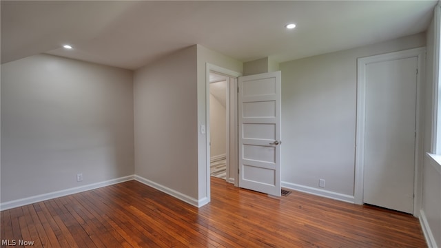 unfurnished bedroom featuring hardwood / wood-style floors