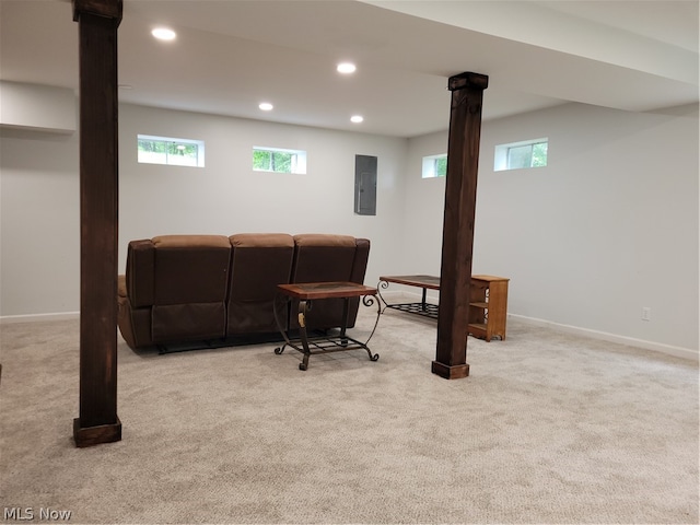 living room featuring carpet flooring and ornate columns