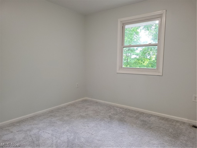 empty room featuring carpet flooring