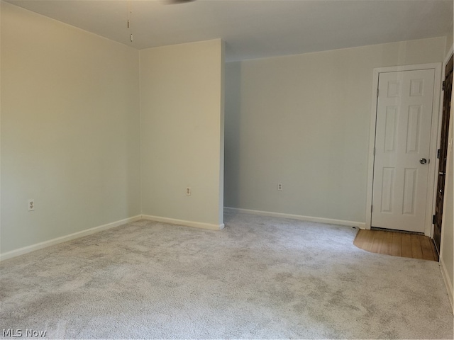 spare room featuring carpet