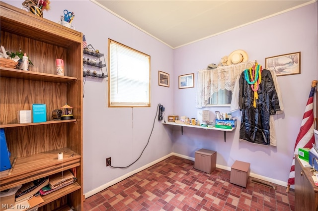 interior space featuring ornamental molding