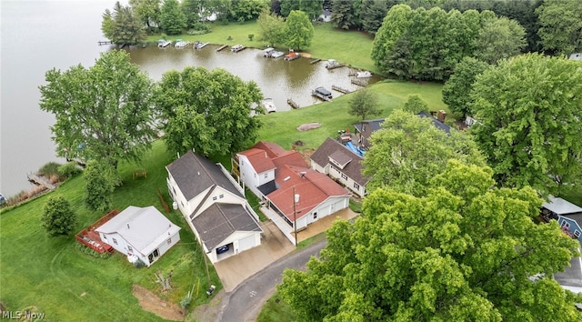 bird's eye view featuring a water view and a residential view