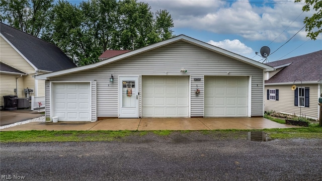 ranch-style house featuring a garage