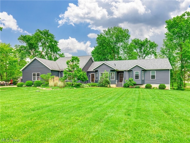 ranch-style house with a front yard