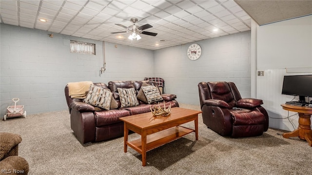 living room with carpet and ceiling fan