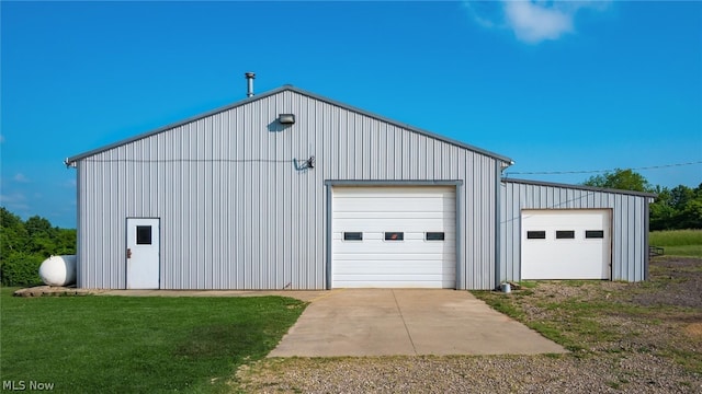 garage with a lawn