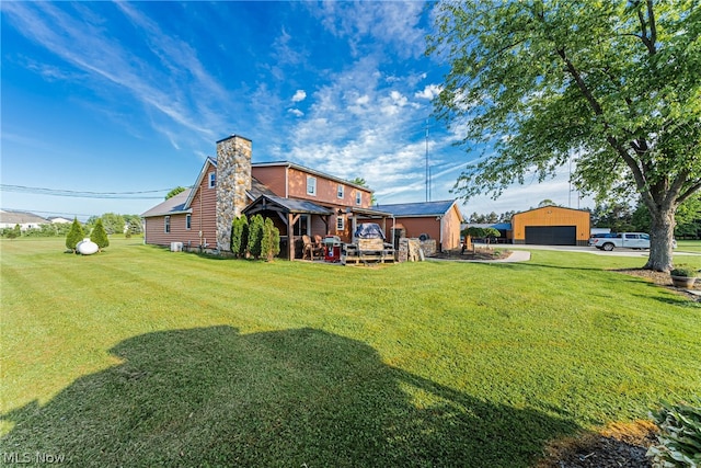 view of yard with a garage