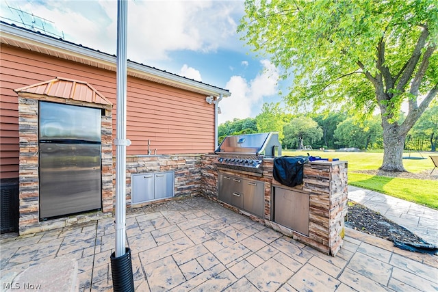 view of patio featuring area for grilling