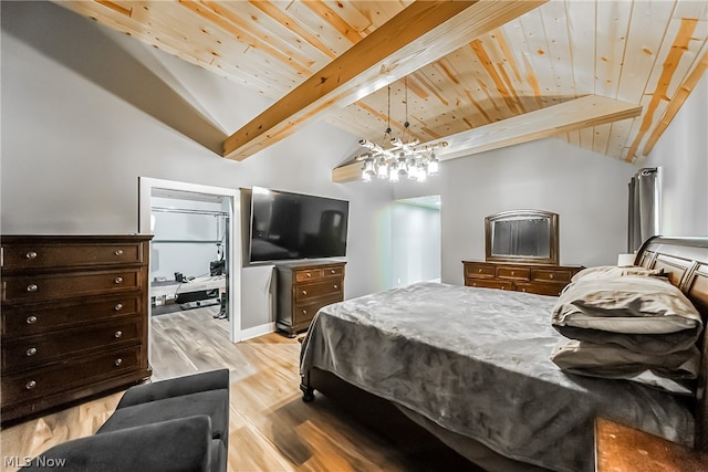 bedroom with a notable chandelier, lofted ceiling with beams, light hardwood / wood-style flooring, and wooden ceiling