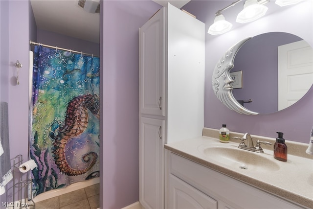 bathroom with vanity and tile patterned floors