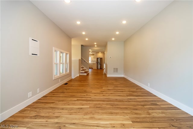 empty room with light wood-type flooring