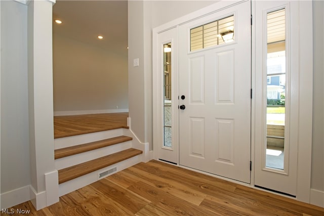 foyer entrance featuring light hardwood / wood-style flooring