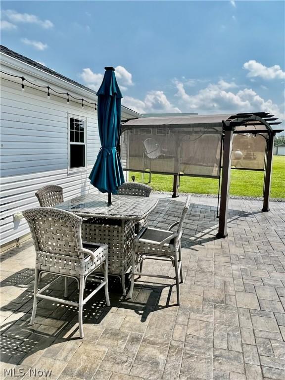 view of patio / terrace featuring a pergola