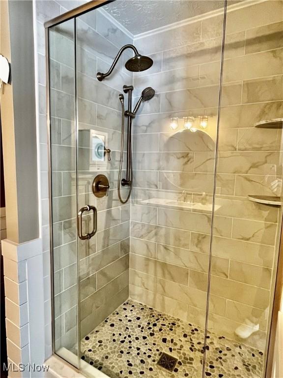 bathroom with an enclosed shower