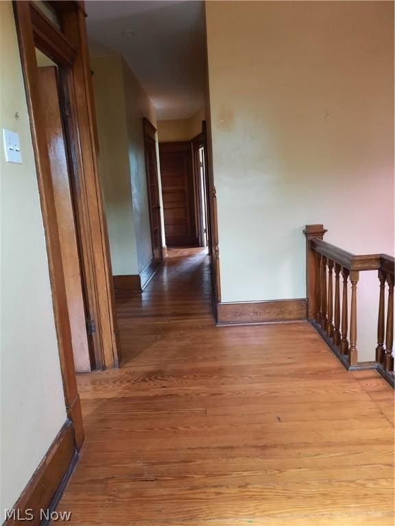 hallway featuring light wood-type flooring