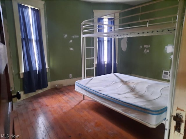 bedroom featuring hardwood / wood-style floors