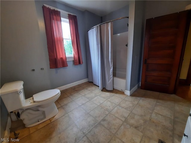 bathroom featuring toilet