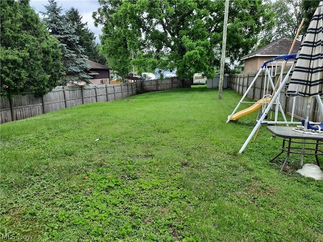 view of yard featuring a playground