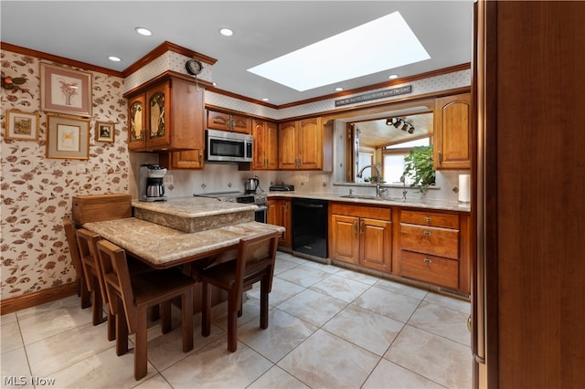 kitchen featuring a skylight, sink, stainless steel appliances, light tile patterned floors, and ornamental molding