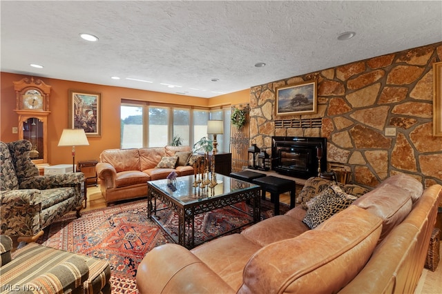 living room featuring a textured ceiling