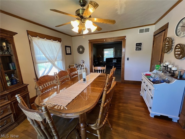 dining room featuring ceiling fan, ornamental molding, and hardwood / wood-style flooring