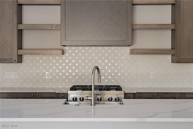 kitchen featuring light stone countertops