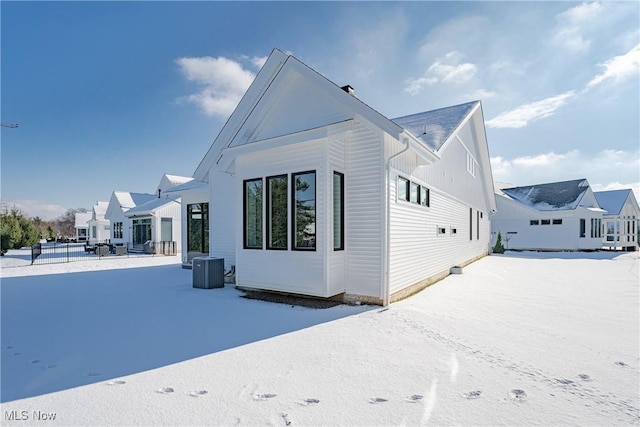 view of property exterior featuring central AC