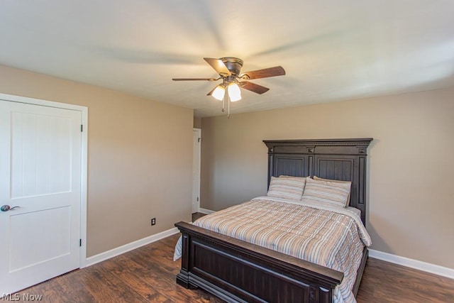 bedroom with dark hardwood / wood-style floors and ceiling fan