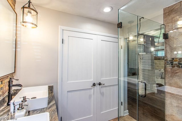 bathroom featuring sink and walk in shower