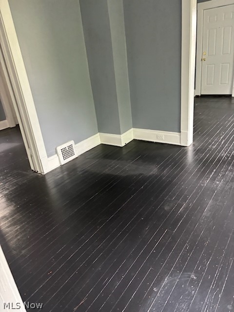 interior space featuring dark hardwood / wood-style flooring