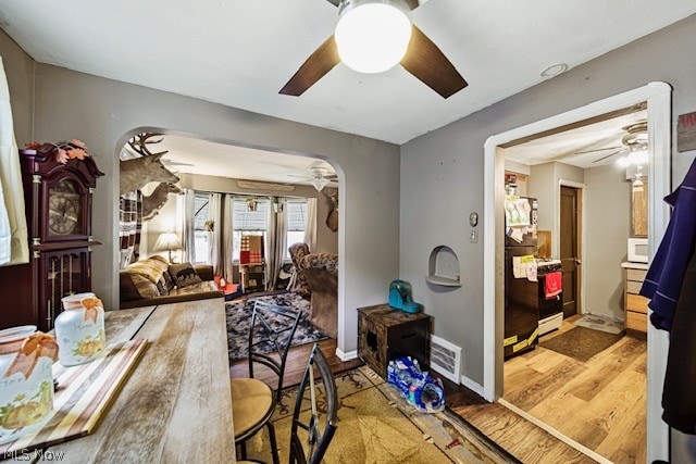 bedroom with light hardwood / wood-style floors and ceiling fan