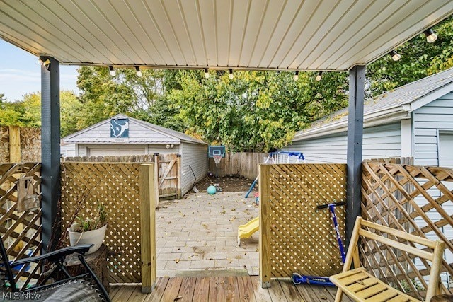 deck with a storage shed