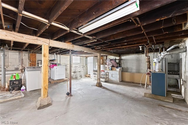 basement with separate washer and dryer