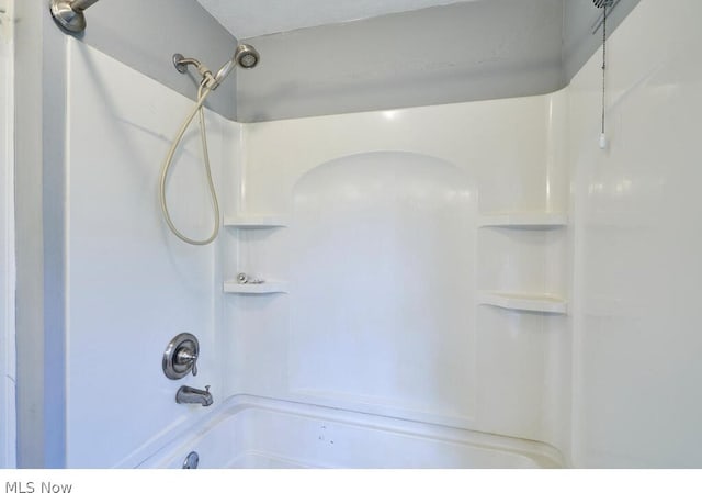 bathroom featuring shower / tub combination