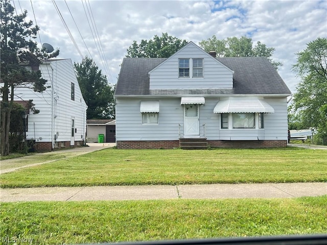 view of front of property with a front lawn