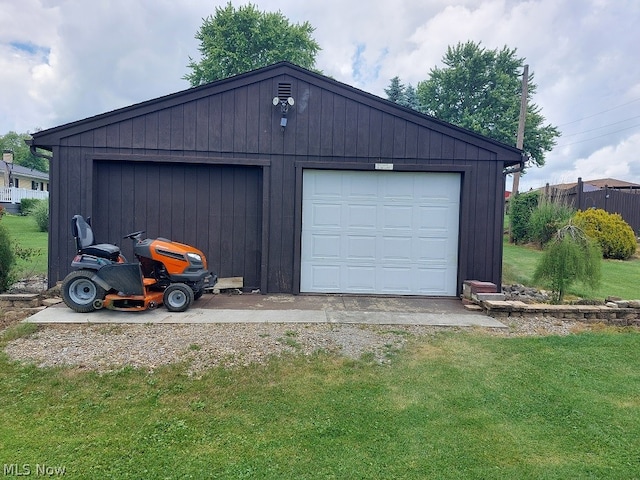 garage with a yard