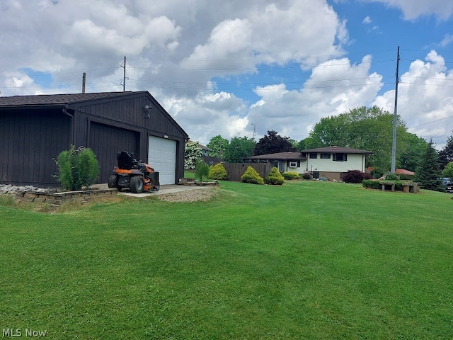 view of yard featuring a garage