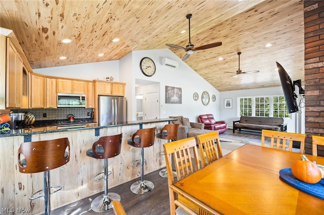 dining room with lofted ceiling, wood ceiling, and hardwood / wood-style floors