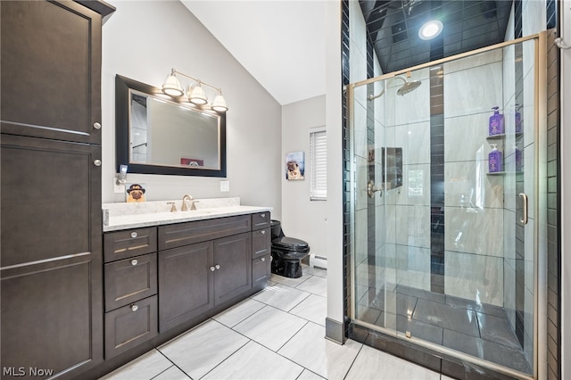 bathroom featuring toilet, tile patterned flooring, an enclosed shower, vaulted ceiling, and vanity