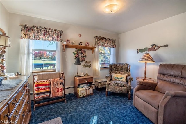 living area with baseboard heating and dark carpet