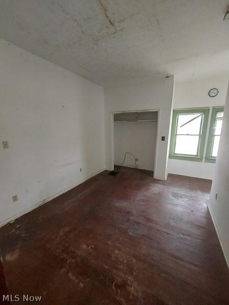 interior space featuring dark wood-type flooring