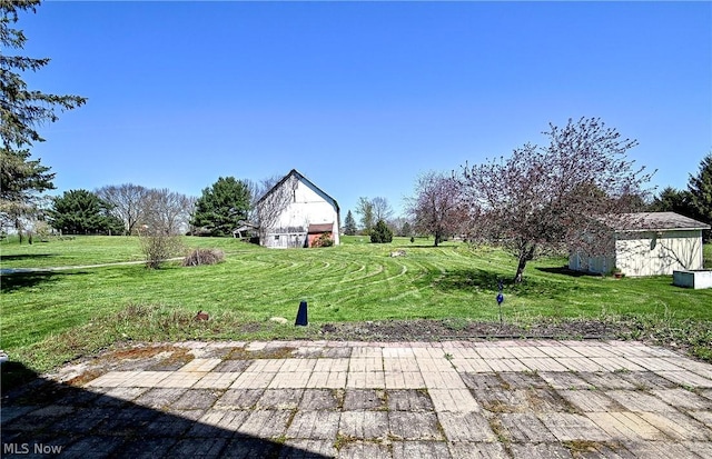 view of patio with a shed