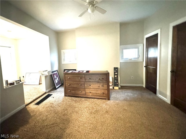 bedroom featuring ceiling fan and carpet floors