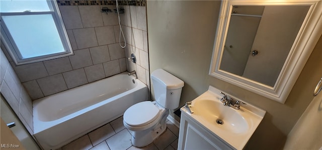 full bathroom with vanity, toilet, tiled shower / bath combo, and tile patterned flooring