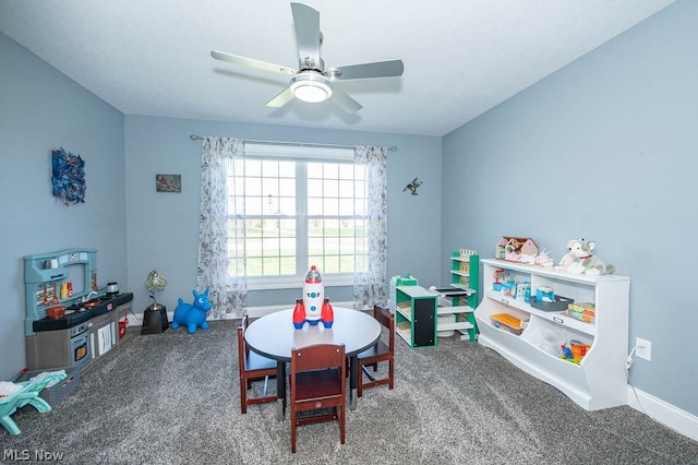 game room with ceiling fan and carpet floors