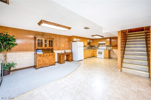 kitchen with sink and white appliances