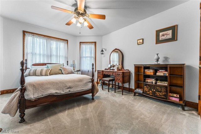 bedroom featuring carpet and ceiling fan