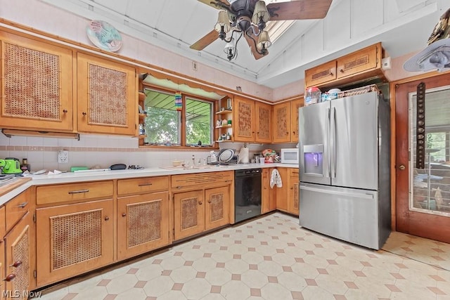 kitchen featuring black dishwasher, stainless steel fridge, white microwave, light countertops, and open shelves