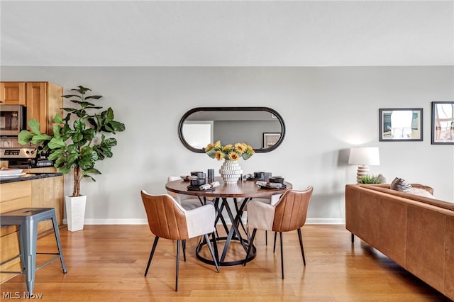 dining area featuring light hardwood / wood-style flooring